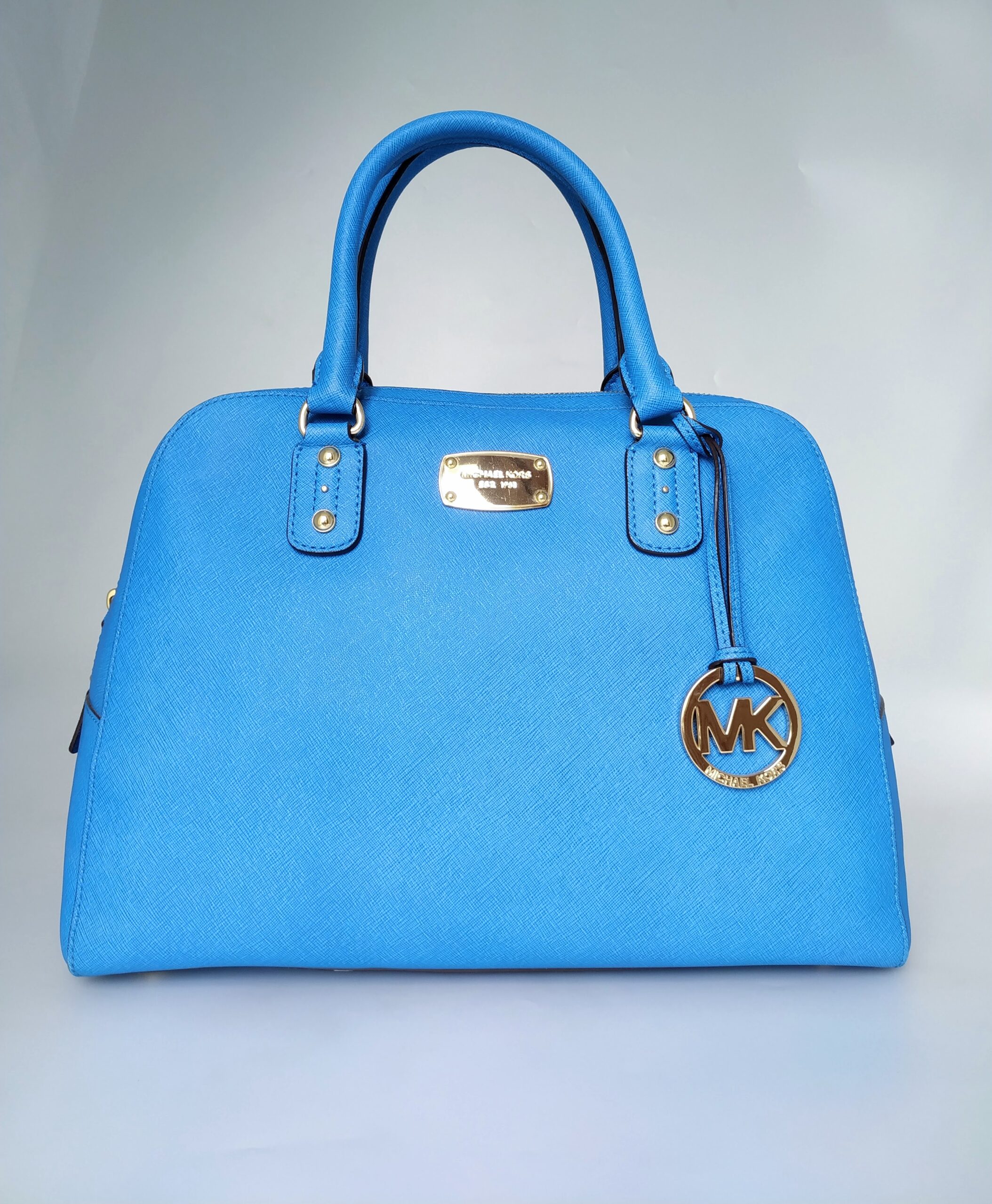MK blue handbag